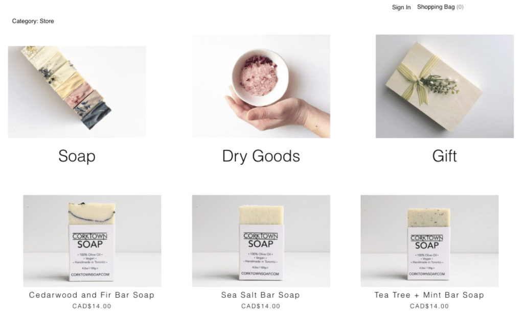 Skärmbild av en e-handelsbutik som säljer tvålar och presenter med en minimalistisk design och ljusa produktbilder.